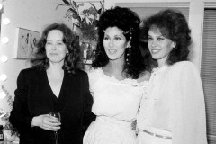 The cast of the Broadway show "Come Back to the Five and Dime, Jimmy Dean, Jimmy Dean" celebrate the debut of the play backstage at New York's Martin Beck Theatre, Thursday night, Feb. 19, 1982.  From left are, Sandy Dennis, Cher, making her Broadway debut, and Karen Black.  (AP Photo/Richard Drew)
