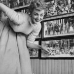 In April 1953 Jan Sterling visits the Elitch Theatre and points out her photo from 1939 when she appeared in the summer stock cast.