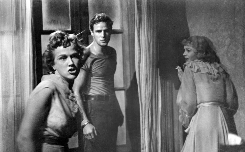 1951 Kim Hunter, Vivien Leigh, and Marlon Brando in A Streetcar Named Desire (1951 film)